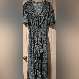 Floral print dark teal dress.